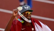 July 18, 2022 Qatar's Mutaz Essa Barshim celebrate winning gold in the men's high jump final REUTERS/Mike Segar