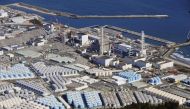 An aerial view shows the storage tanks for treated water at the tsunami-crippled Fukushima Daiichi nuclear power plant in Okuma town, Fukushima prefecture, Japan, on February 13, 2021.  File Photo / Reuters
