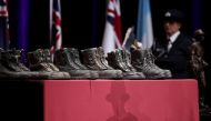 Boots honouring the firefighters killed in the Australian bushfires are seen at a state memorial at Qudos Bank Arena in Sydney, New South Wales, Australia, February 23, 2020. REUTERS/Loren Elliott/File Photo