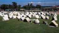 A general view of relief camps established for the flood victims following rains and floods during the monsoon season in Charsadda, Pakistan, on August 28, 2022. REUTERS/Fayaz Aziz
