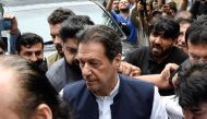 Pakistan's former Prime Minister Imran Khan, who is facing terrorism charges, appears in court to extend pre-arrest bail, in Islamabad, on August 25, 2022. REUTERS/Waseem Khan 