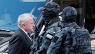 US ambassador to Russia John Sullivan walks past members of the Federal Protective Service as he arrives to attend a memorial service for Mikhail Gorbachev, the last leader of the Soviet Union, at the Column Hall of the House of Unions in Moscow, Russia, September 3, 2022. (REUTERS/Shamil) Zhumatov