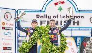 Qatar’s Nasser Al Attiyah and his French co-driver Mathieu Baumel on the podium following the 44th Rally of Lebanon at the Automobile and Touring Club of Lebanon (ATCL) in Jounieh, Lebanon yesterday.