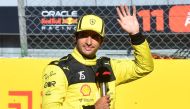 Ferrari's Charles Leclerc gives a speech after qualifying in pole position at the Italian Grand Prix in Autodromo Nazionale Monza, Monza, on September 10, 2022.   REUTERS/Jennifer Lorenzini