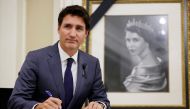 Canada's Prime Minister Justin Trudeau signs a book of condolences for Britain's Queen Elizabeth at Rideau Hall in Ottawa, Ontario, on September 9, 2022. REUTERS/Blair Gable