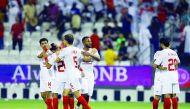 Al Arabi's Abdulaziz Al Ansari celebrates with team-mates. Pic: Mohamed Farag