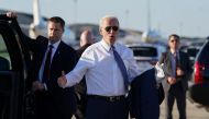 US President Joe Biden reacts to reporters as he departs Washington to vote in the Delaware primary election, from Joint Base Andrews in Maryland, on September 13, 2022. REUTERS/Kevin Lamarque