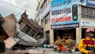 Firefighters work at the site where a building collapsed following a 6.8-magnitude earthquake, in Yuli, Hualien county, Taiwan September 18, 2022. Taiwan's 0918 Earthquake Central Emergency Operations Centre/Handout via Reuters