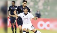 Al Sadd's Santi Cazorla shoots at the goal.
