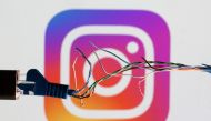 Broken Ethernet cable is seen in front of Instagram logo in this illustration taken on March 11, 2022.  File Photo / Reuters
