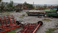 Agricultural machinery destroyed by Russian shelling are seen, as Russia's attack on Ukraine continues, in the village of Dolyna, Ukraine, on September 23, 2022. REUTERS/Gleb Garanich