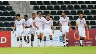 Al Sadd players celebrate after defeating Al Wakrah.