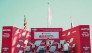 Qatari rider Hamad Al Sahouti with other podium winners Shinya Ezawa and Hakim Danish.
