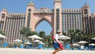 File Photo: A beach lifeguard wearing facemask is seen at the Atlantis The Palm hotel in Dubai, United Arab Emirates, July 7, 2020. (REUTERS/Ahmed Jadallah)