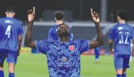 Al Duhail's Micheal Olunga celebrates after scoring a hat-trick.