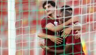 Qatar U17 players celebrate a goal yesterday. 