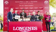 Qatar Olympic Committee President H E Sheikh Joaan bin Hamad Al Thani receives the Prix de l’Opera Longines trophy following the Gr1 victory of Al Shaqab Racing’s Place Du Carrousel at the ParisLongchamp racecourse, yesterday.