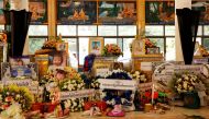 Tributes are placed for the victims at Wat Rat Samakee temple following a mass shooting in the town of Uthai Sawan, Nong Bua Lam Phu province, Thailand October 8, 2022. Reuters/Jorge Silva