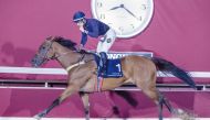 Jockey Lukas Delozier guides Angelic Queen to Al Ghariya Cup victory at the Al Rayyan Racecourse yesterday. PICTURES: Juhaim/QREC
