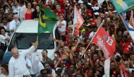 Former Brazil's President and presidential candidate Luiz Inacio Lula da Silva takes part in a rally in Salvador, Bahia state, Brazil, on October 12, 2022. REUTERS/Felipe Iruata.