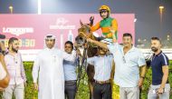 The connection of Al Shomos pose following  the Al Hamla Cup victory.  PIC: Juhaim/QREC 