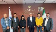 Iran's Minister of Youth Affairs and Sports Hamid Sajjadi meets with Iranian climber Elnaz Rekabi in Tehran, Iran, on October 19, 2022. Office of Iran's Sports Ministry/WANA (West Asia News Agency)/Handout via REUTERS