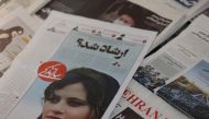 A newspaper with a cover picture of Mahsa Amini, a woman who died after being arrested by Iranian morality police is seen in Tehran, Iran, on September 18, 2022. File Photo / Reuters