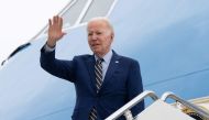 US President Joe Biden boards Air Force One prior to his departure from Cambodia's Phnom Penh International Airport on November 13, 2022, as he travels to Bali, Indonesia to attend the G20 Summit. (Photo by SAUL LOEB / AFP)
