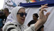 In this file photo taken on November 29, 2019, the president of the human rights organization Madres de Plaza de Mayo, Hebe de Bonafini, waves as she arrives at the 