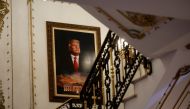 A portrait of former US President Donald Trump over the White House is seen on a stairway of his Mar-a-Lago estate before he announced that he will once again run for US president in the 2024 US presidential election, during an event at in Palm Beach, Florida, US, on November 15, 2022. REUTERS/Jonathan Ernst/File Photo