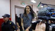 File Photo: US basketball player Brittney Griner is escorted before the verdict in Khimki outside Moscow, Russia, August 4, 2022. (REUTERS/Evgenia Novozhenina)