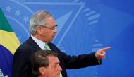 Brazil's President Jair Bolsonaro talks with Brazil's Economy Minister Paulo Guedes during a news conference at the Planalto Palace in Brasilia, Brazil, onJune 6, 2022. File Photo / Reuters