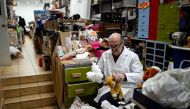 Antonio Martinez Rivas, 70 years old, puts new stuffing in a 