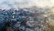Aerial view of houses destroyed by a forest fire that affected the hills of Vina del Mar, in the Valparaiso region, Chile, on December 23, 2022. (Photo by Javier Torres / AFP)