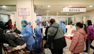 Patients line up for treatment at the emergency department of Beijing Chaoyang hospital, amid the coronavirus disease (COVID-19) outbreak in Beijing, China December 27, 2022. China Daily via Reuters
