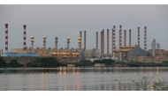 A general view of Abadan oil refinery in southwest Iran, is pictured from Iraqi side of Shatt al-Arab in Al-Faw south of Basra, Iraq, on September 21, 2019.  File Photo / Reuters
