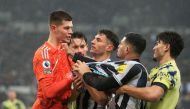 Leeds United's goalkeeper Illan Meslier (left) clashes with Newcastle United's Brazilian midfielder Bruno Guimaraes (second right) during the English Premier League match between Newcastle United and Leeds United at St James' Park in Newcastle-upon-Tyne, north east England on December 31, 2022. (Photo by Lindsey Parnaby / AFP)
