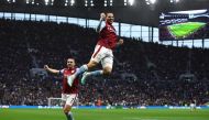 Aston Villa's Emiliano Buendia celebrates scoring their first goal with John McGinn during the English Premier League match against Tottenham Hotspur at the Tottenham Hotspur Stadium in London on January 1, 2023. Action Images via Reuters/Paul Childs 