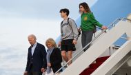 US President Joe Biden and First Lady Jill Biden disembark Air Force One with their grandchildren Natalie and Hunter at Joint Base Andrews in Maryland on January 2, 2023. - The Bidens are returning to the White House following a holiday vacation in the US Virgin Islands. (Photo by SAUL LOEB / AFP)