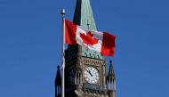File Photo: A Canadian flag flies in front of the Peace Tower on Parliament Hill in Ottawa, Ontario, Canada, March 22, 2017. (REUTERS/Chris Wattie)