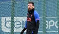 Paris Saint-Germain's Argentine forward Lionel Messi takes part in a training session at the club's 