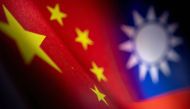Chinese and Taiwanese printed flags are seen in this illustration taken April 28, 2022. (REUTERS/Dado Ruvic)