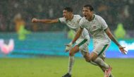 Iraq's midfielder Ibrahim Bayesh (right) celebrates scoring during the Arabian Gulf Cup football match between Iraq and Saudi Arabia at the Basra International Stadium in Iraq's eponymous southern city on January 9, 2023. (Photo by Hussein Faleh / AFP)