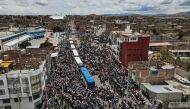 Demonstrators depart to Lima to protest against the government of Peruvian President Dina Boluarte in the city of Ilave, Puno, southern Peru on January 17, 2023. (Photo by Juan Carlos Cisneros / AFP)