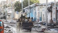 Somali security officers drive past a section of Hotel Hayat, the scene of an al Qaeda-linked al Shabaab group militant attack in Mogadishu, Somalia on August 20, 2022. File Photo / Reuters