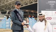 Director of Joint Services Department, The Social & Sport Contribution Fund (Daam), Yousef Mohammed Al Nuaimi presents the winner's trophy to Faleh Suwead Al Ajami.
