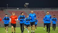Al Arabi players take part in a training session, yesterday.