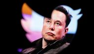 Elon Musk's photo is seen through a Twitter logo in this illustration taken October 28, 2022. File Photo: Reuters/Dado Ruvic





