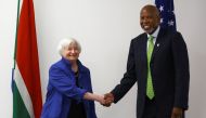 US Treasury Secretary Janet Yellen shakes hands with South African Reserve Bank Governor Lesetja Kganyago, at the Reserve Bank Offices in Pretoria, South Africa, January 26, 2023. (REUTERS/Siphiwe Sibeko)