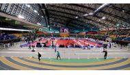 A general view inside the Aspire Dome during the Qatar Grand Prix Fencing Championship 2023. INSETS: Fencers in action 